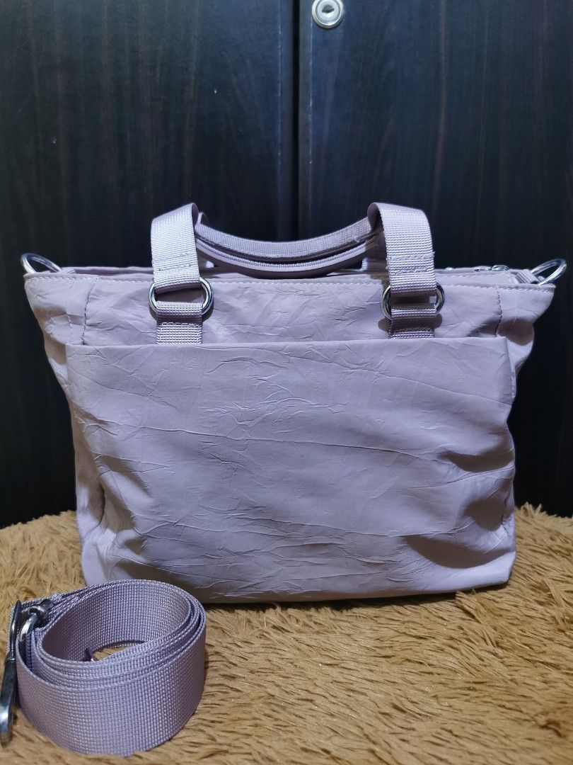 Nylon Crossbody / HandBag (Category: Cross-body Bags) located in Aringay. Submitted by ycels_purselove (Listing ID 1461738433, Image 2). Description: Nylon Crossbody / Handbag *no brand w/ sling strap Condition: Like new.