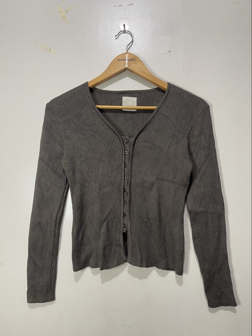 NYMPH Soft Ribbed V-neck Cardigan (Category: Coats, Jackets and Outerwear) located in Davao. Submitted by yannrussel00 (Listing ID 1461701958, Image 2). Description: Size fits Medium Dimes W15.5 x L20 laid flat Condition 10/10 Like new Ganda nito. Makapal yung tela nya No issue First pic like when worn purposes only. Not the same item .