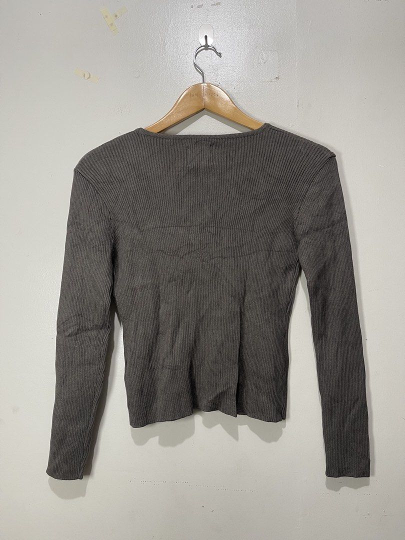 NYMPH Soft Ribbed V-neck Cardigan (Category: Coats, Jackets and Outerwear) located in Davao. Submitted by yannrussel00 (Listing ID 1461701958, Image 3). Description: Size fits Medium Dimes W15.5 x L20 laid flat Condition 10/10 Like new Ganda nito. Makapal yung tela nya No issue First pic like when worn purposes only. Not the same item .