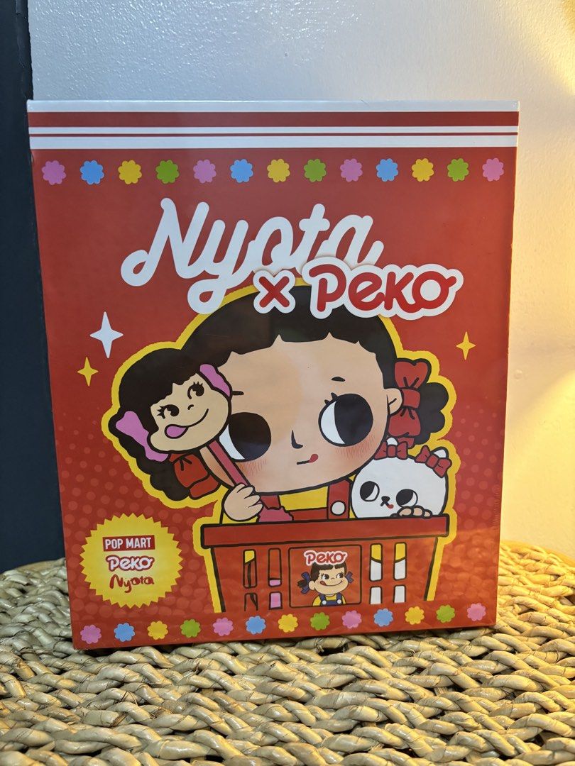 Nyota x Peko Popmart Collab (Category: Designer & Blind Box Toys) located in Mandaluyong City. Submitted by izciji (Listing ID 1461778292, Image 1). Description: Never Opened, Brand New Condition Super impulse buy to the point I never opened it out of guilt Negotiable price Has an authentication sticker on the back Onhand.