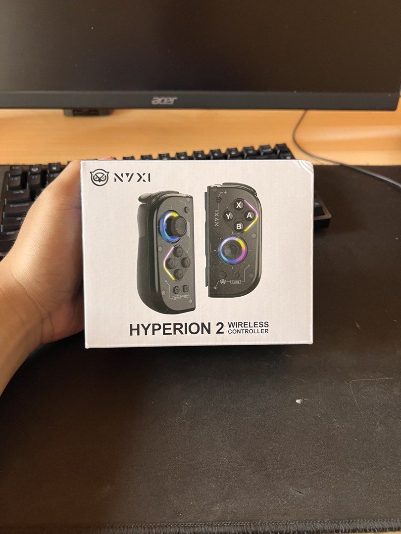 NYXI Hyperion 2 Wireless Controller for Nintendo Switch (Category: Controllers) located in Tuguegarao City. Submitted by kuroumu148 (Listing ID 1461564144, Image 1). Description: - NYXI Hyperion 2 Wireless Controller - Compatible with Nintendo Switch - Features vibrant RGB lighting - Comes in original packaging - Easy to connect and use - Perfect for gaming at home or on the go.