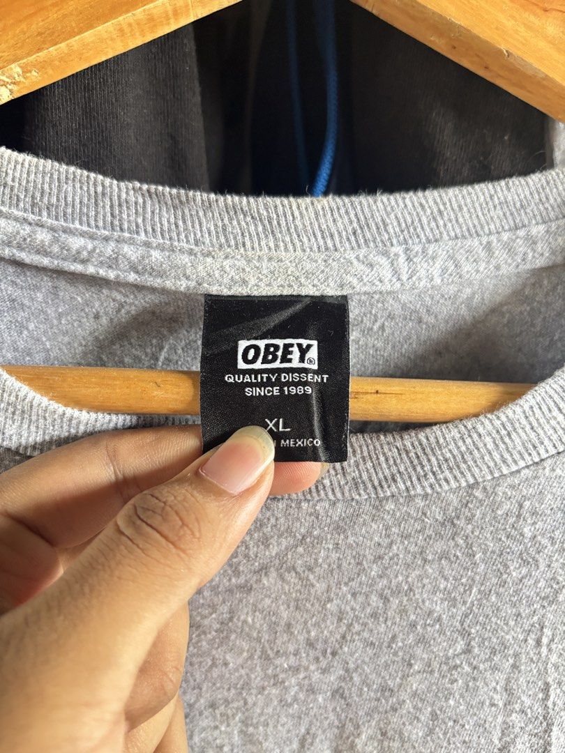 Obey Awareness Shirt (Category: Tshirts & Polo Shirts ) located in Taguig. Submitted by nardselect (Listing ID 1461572815, Image 3). Description: Obey Awareness Tag Size: XL Width: 24 Length: 30 Condition: Good Flaws: Stains, need wash, Hair lines .