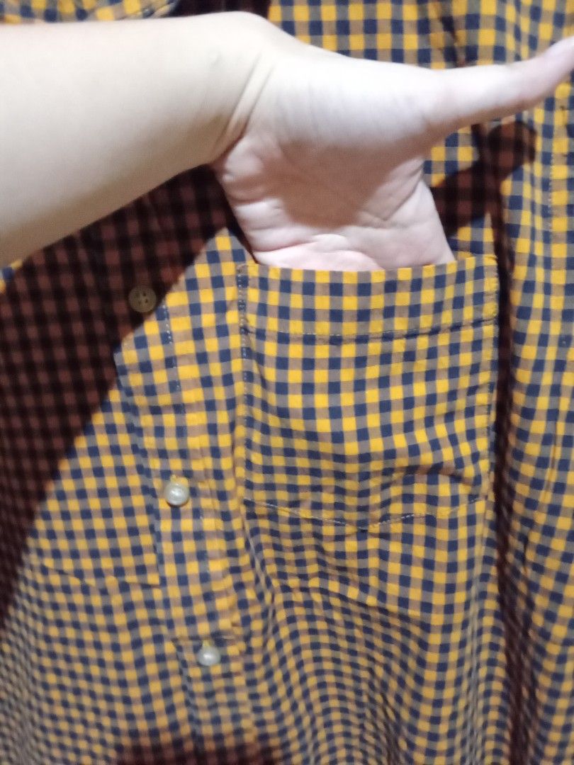 Old Navy Gingham Long Sleeve Shirt (Category: Formal Shirts) located in San Fernando. Submitted by _luxielleph (Listing ID 1461796985, Image 3). Description: - Brand: Old Navy - Color: Orange and Navy Gingham - Style: Long sleeve, button-up shirt - Pattern: Classic checkered - Size: L - Perfect for: Casual wear or layering.