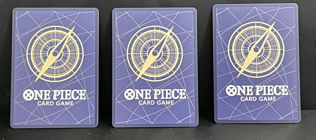 One Piece Card Set of 3 (Category: Raw Singles) located in Pasig City. Submitted by giyomi35 (Listing ID 1461779641, Image 2). Description: set of 3 For Sale Only 2.5k with white dents lower right corner Loc: Pasig Santolan ( Meet ups) Mop:Gcash/Maya/Paypal/BDO Mod:Lala/grab/JNT.