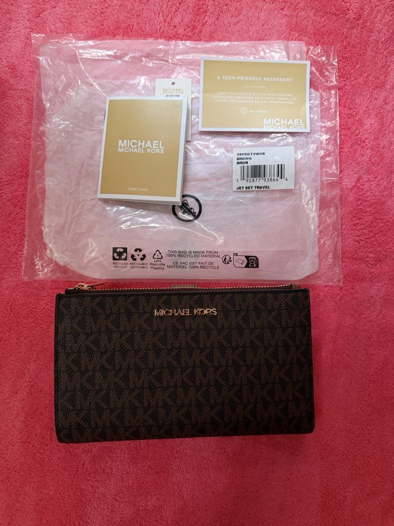Original Mk Jet Set Monogram Wallet (Category: Wallets & Card holders) located in Cebu City. Submitted by au_dy008 (Listing ID 1461564812, Image 2). Description: guranteed original us bought.