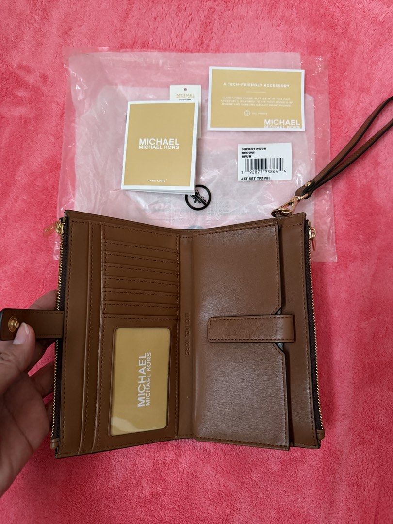 Original Mk Jet Set Monogram Wallet (Category: Wallets & Card holders) located in Cebu City. Submitted by au_dy008 (Listing ID 1461564812, Image 3). Description: guranteed original us bought.