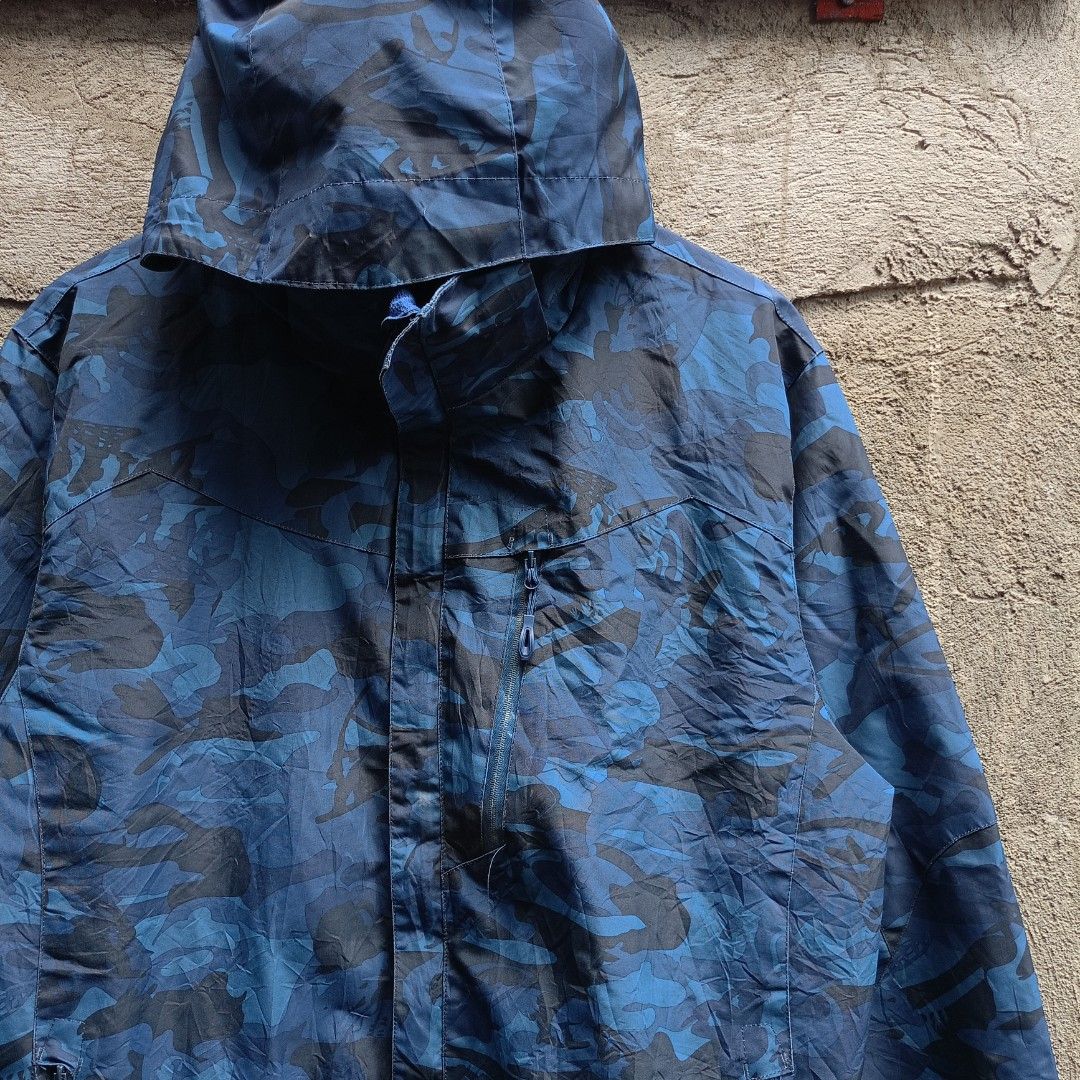 OUTDOOR WEAR BLUE CAMOUFLAGE JACKET (Category: Coats, Jackets and Outerwear) located in Koronadal. Submitted by thriflex.29 (Listing ID 1461692291, Image 3). Description: OUTDOOR WEAR BLUE CAMOUFLAGE JACKET Size On Tag: Large Measurements: Width 23.5 Length 28 Condition: 9/10 - Excellent Colorate: 9/10 No Issue Mine: 400.