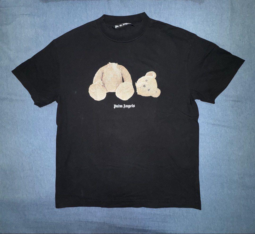 Palm Angels (Category: Tshirts & Polo Shirts ) located in Daraga. Submitted by cariboy_1125 (Listing ID 1461728882, Image 2). Description: XL on tag 23 x 29 via tape measure Issue: Missing letter "L" on neck tag and slight back print crack Overall: Very good condition.