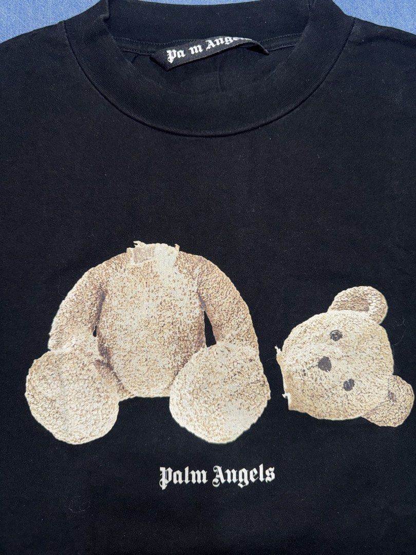 Palm Angels (Category: Tshirts & Polo Shirts ) located in Daraga. Submitted by cariboy_1125 (Listing ID 1461728882, Image 3). Description: XL on tag 23 x 29 via tape measure Issue: Missing letter "L" on neck tag and slight back print crack Overall: Very good condition.
