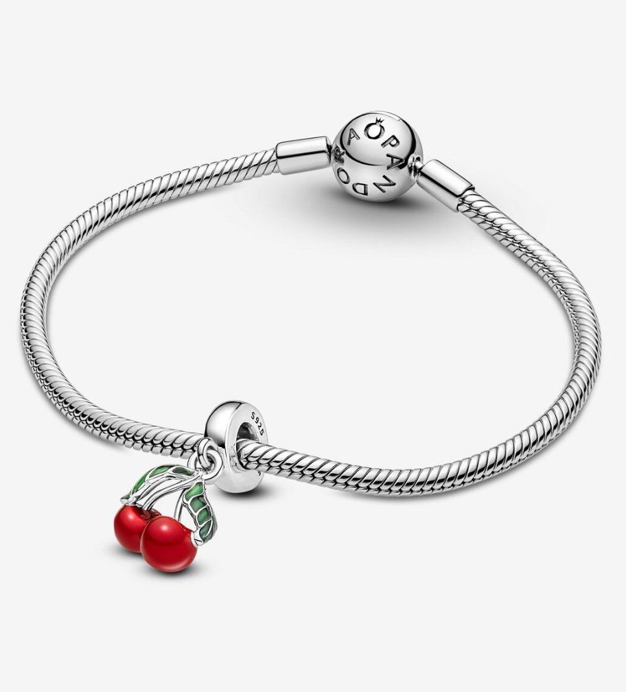Pandora Sterling Silver Cherry Dangle Charm (Category: Charms) located in Makati City. Submitted by Pipie (Listing ID 1461568805, Image 3). Description: - Authentic Pandora Charm - Cute Cherry Design with Green Enamel Leaves - Made of Sterling Silver - Dangles Nicely on a Bracelet - Ideal Gift for Fruit or Pandora Enthusiasts - Adds a Pop of Color to Your Jewelry Collection.