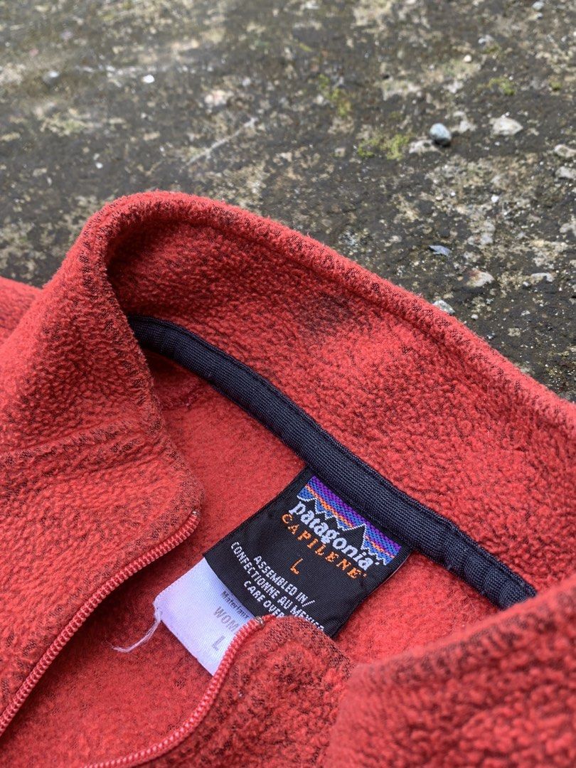 Patagonia Capilene Fleece Pullover Size L (Category: Coats, Jackets and Outerwear) located in Baguio. Submitted by jasthrift_ (Listing ID 1461648551, Image 3). Description: - Patagonia Capilene Fleece Pullover - Color: Coral Red - Size: L - Features a quarter zip neck - Soft and warm material, ideal for layering - Suitable for outdoor activities and casual wear.