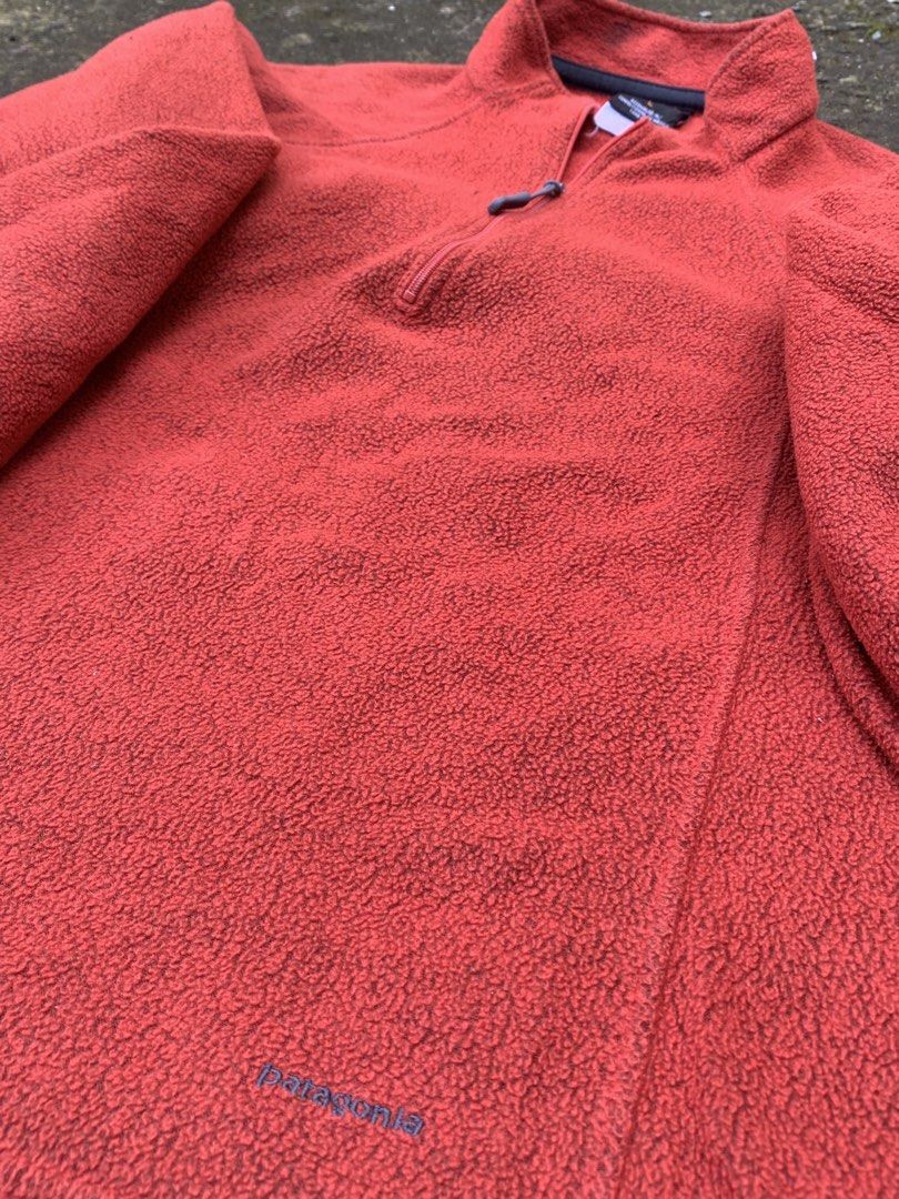Patagonia Capilene Fleece Pullover Size L (Category: Coats, Jackets and Outerwear) located in Baguio. Submitted by jasthrift_ (Listing ID 1461648551, Image 2). Description: - Patagonia Capilene Fleece Pullover - Color: Coral Red - Size: L - Features a quarter zip neck - Soft and warm material, ideal for layering - Suitable for outdoor activities and casual wear.