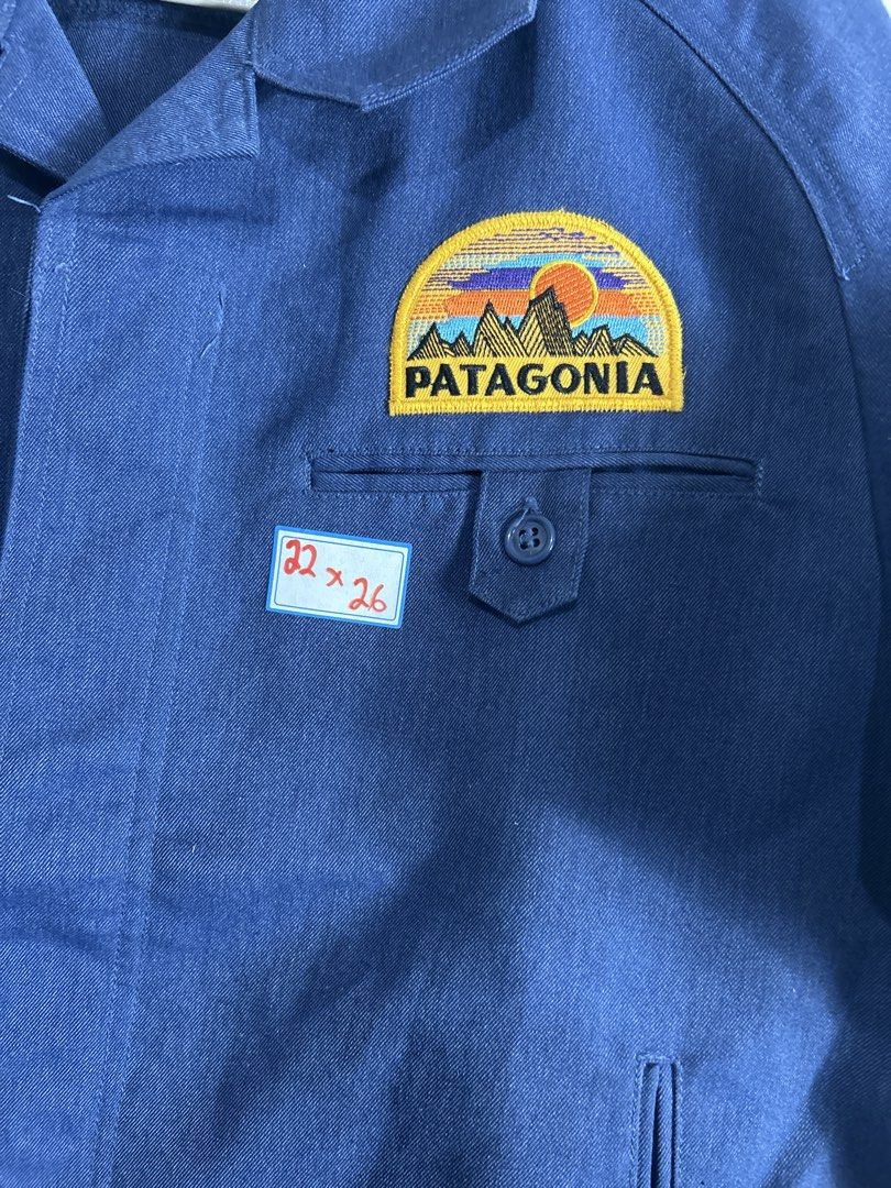 Patagonia Work Jacket Blue Patch (Category: Coats, Jackets and Outerwear) located in Mandaluyong City. Submitted by 0lg2026 (Listing ID 1461605263, Image 3). Description: - Blue Patagonia work jacket - Classic Patagonia mountain logo patch on chest - Button-up front - Two front pockets - Durable cotton blend fabric - Ideal for everyday wear or outdoor activities.