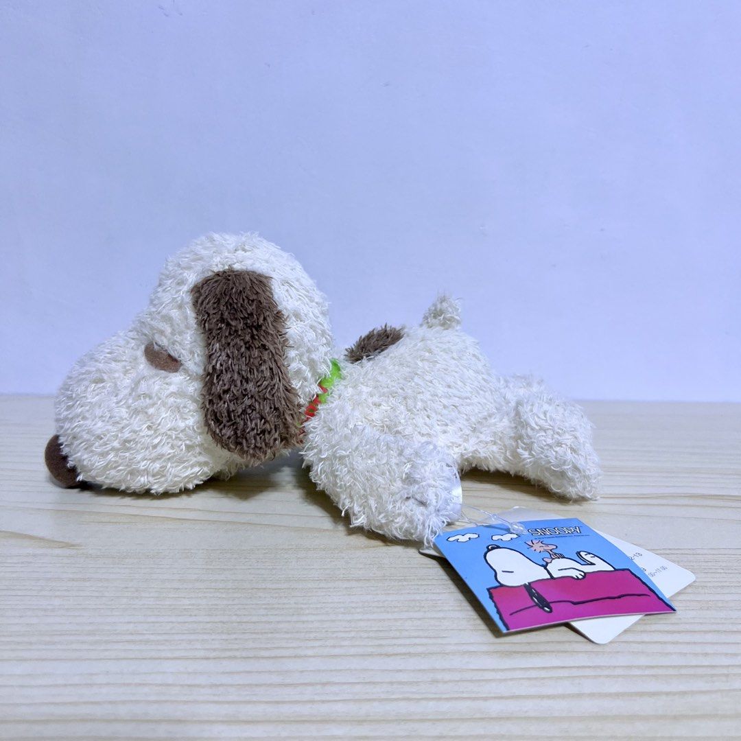 Peanuts Snoopy Lying Down Plush 20x9cm - Php 250 (Category: Plushies & Soft Toys) located in Davao. Submitted by pandorastoybox (Listing ID 1461748842, Image 1). Description: Peanuts Snoopy Lying Down Plush 20x9cm - Php 250.