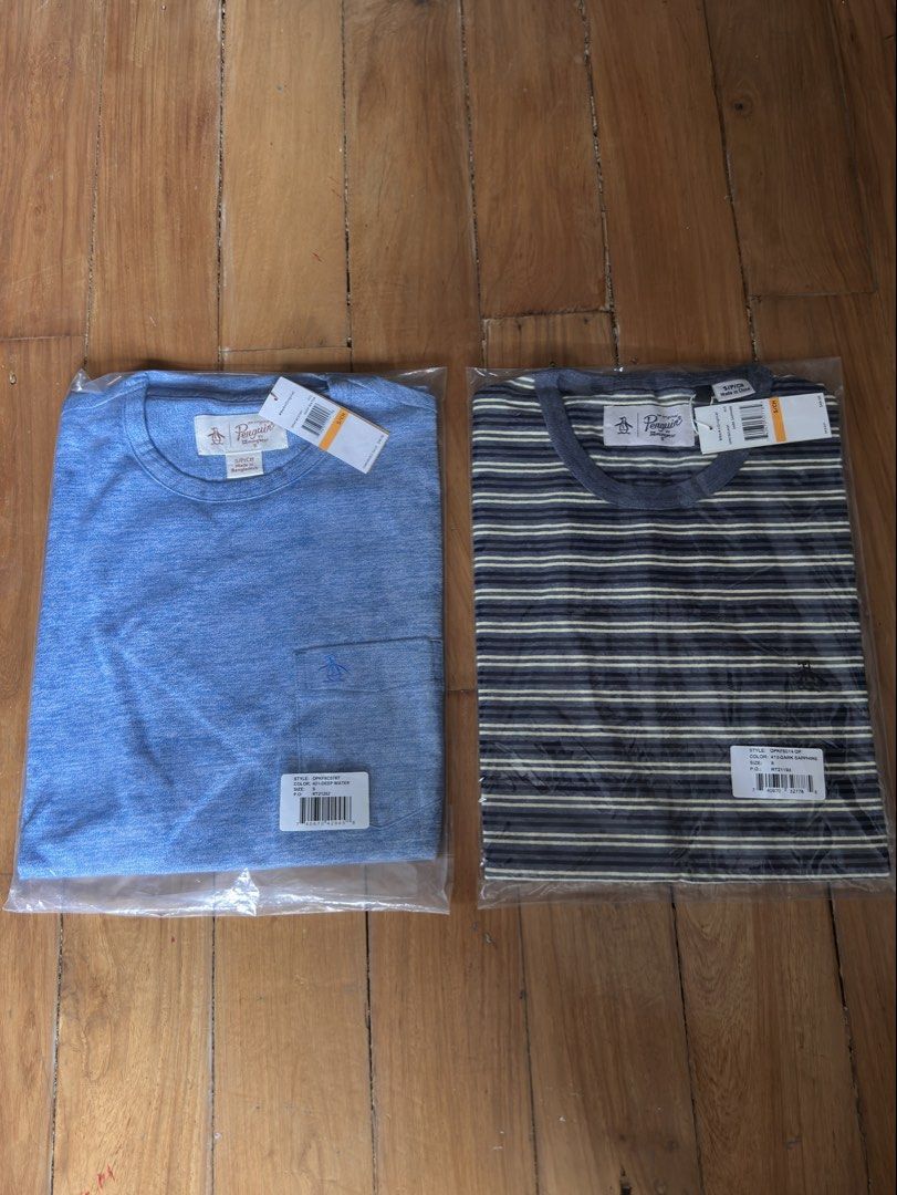 Penguin T-Shirts - Blue & Striped (Category: Tshirts & Polo Shirts ) located in Manila. Submitted by zachery512 (Listing ID 1461641446, Image 1). Description: 1500 each both size small with original tag and packaging take 2 for disc .