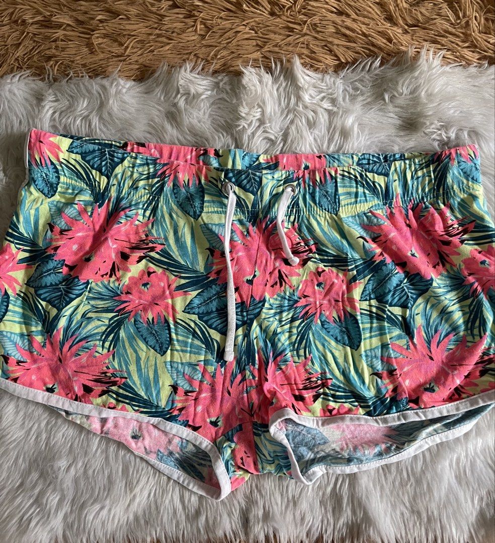 PEP & Co sexy dolphin shorts (Category: Shorts) located in Cainta. Submitted by zlove111 (Listing ID 1461613392, Image 1). Description: - Cute PEP & CO tropical print shorts - Vibrant floral and leaf pattern (pink, blue, yellow) - Elastic waistband with white drawstring - White trim along the hem - Ideal for lounging or casual wear 30-34.