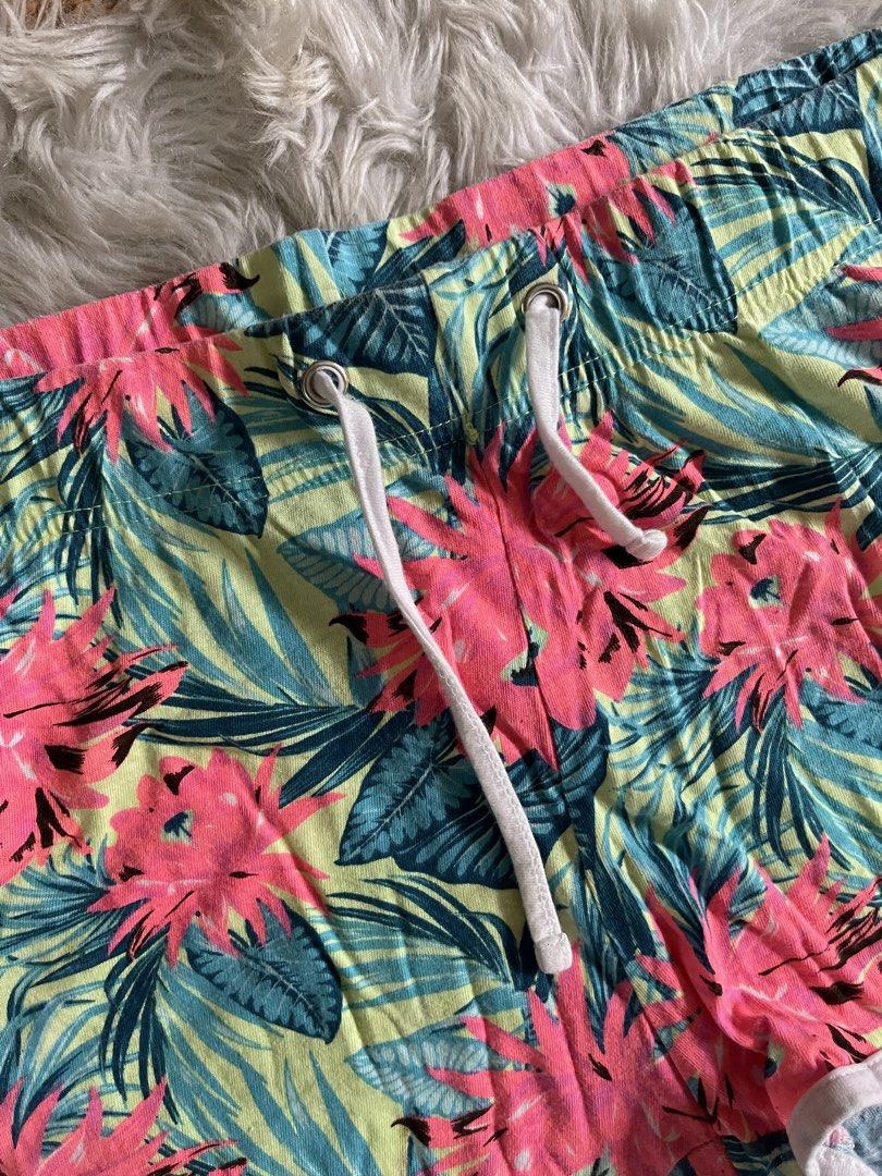 PEP & Co sexy dolphin shorts (Category: Shorts) located in Cainta. Submitted by zlove111 (Listing ID 1461613392, Image 2). Description: - Cute PEP & CO tropical print shorts - Vibrant floral and leaf pattern (pink, blue, yellow) - Elastic waistband with white drawstring - White trim along the hem - Ideal for lounging or casual wear 30-34.