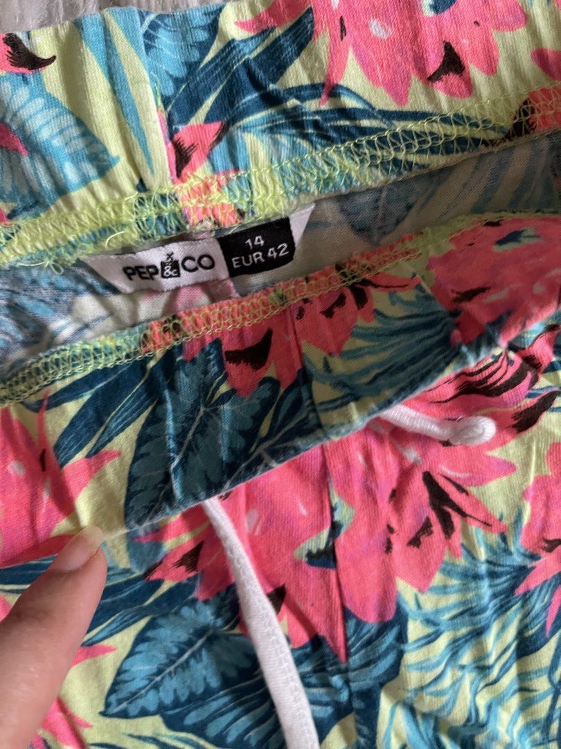 PEP & Co sexy dolphin shorts (Category: Shorts) located in Cainta. Submitted by zlove111 (Listing ID 1461613392, Image 3). Description: - Cute PEP & CO tropical print shorts - Vibrant floral and leaf pattern (pink, blue, yellow) - Elastic waistband with white drawstring - White trim along the hem - Ideal for lounging or casual wear 30-34.