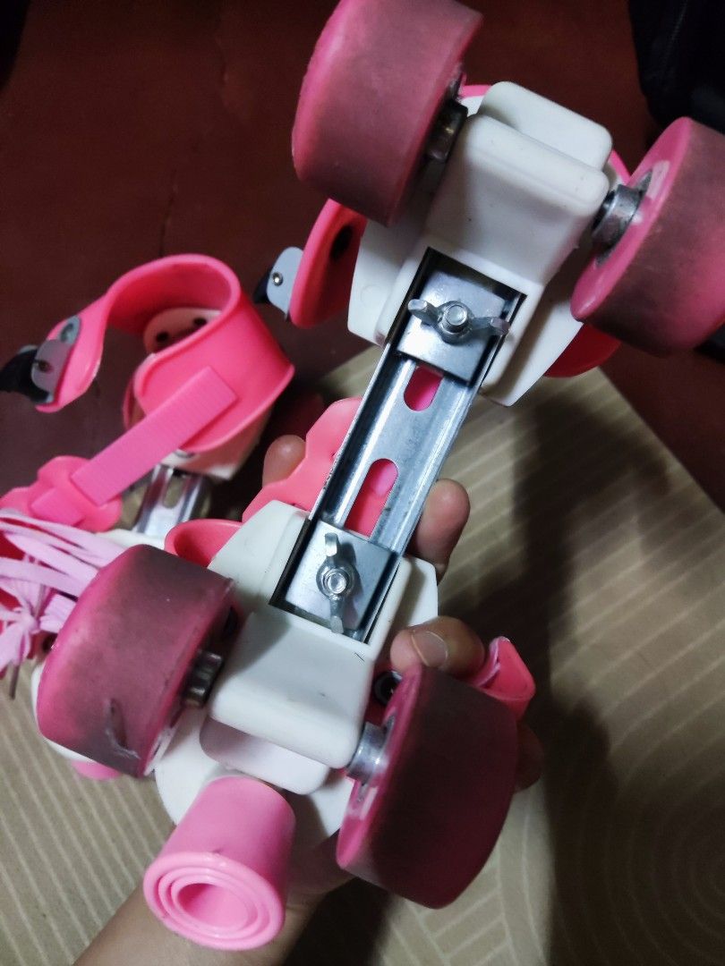 Pink Adjustable Roller Skates for Kids (Category: Skates, Rollerblades & Scooters) located in Pateros City. Submitted by starry__night__20951 (Listing ID 1461589210, Image 3). Description: - Adjustable roller skates for kids - Bright pink and white design - Secure fit with laces and velcro straps - Pink wheels - Ideal for learning to skate - Shows some scuffs on wheels from use, but still in great working condition and lots of fun left! Orig pric