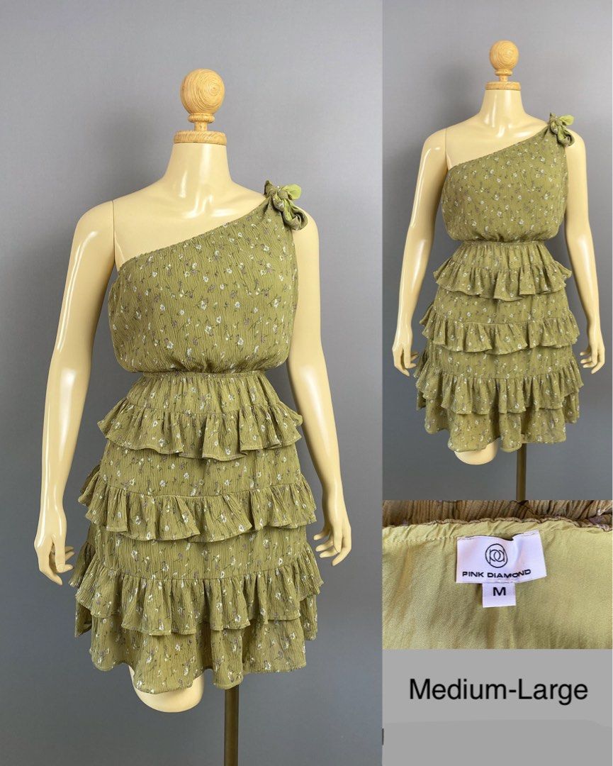 Pink Diamond One Shoulder Ruffle Dress Medium-Large (Category: Dresses) located in Cebu City. Submitted by bella_sanina_cebu (Listing ID 1461743279, Image 1). Description: - Adorable one-shoulder dress - Features a charming floral print - Skirt adorned with playful ruffles - Size: Medium-Large - Versatile for parties or casual outings.