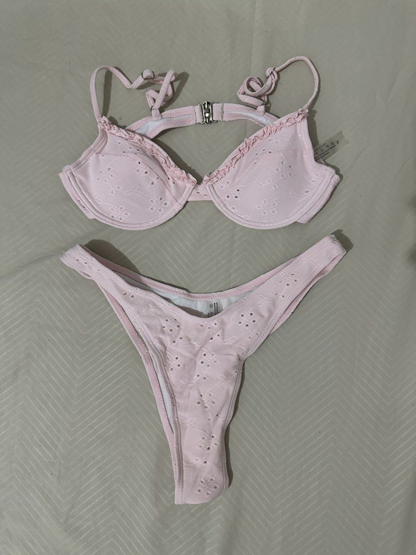 Pink Eyelet Bikini Set with Ruffle Trim (Category: Bikinis & Swimsuits) located in Lipa City. Submitted by chiechums (Listing ID 1461566237, Image 1). Description: - Adorable pink bikini set - Features a delicate eyelet floral pattern all over - Top has a stylish ruffled trim - Adjustable straps for a perfect fit - Thong style bottoms - Ideal for your next beach or pool day.