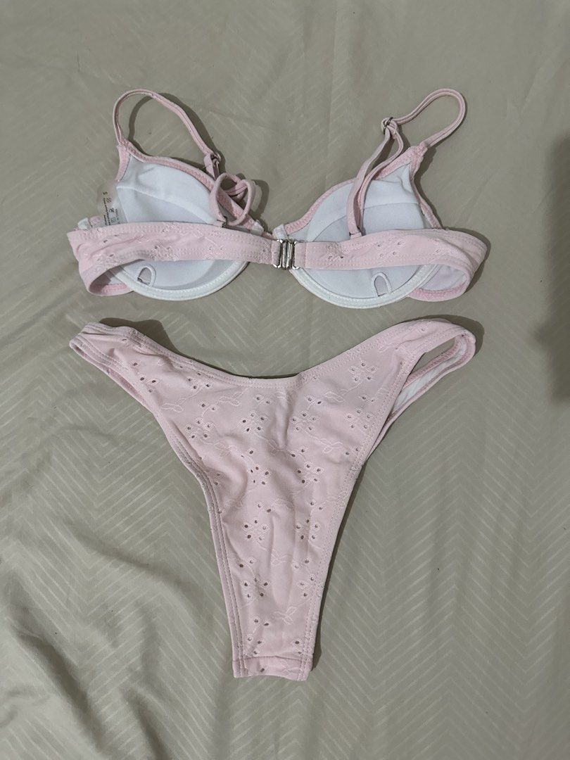 Pink Eyelet Bikini Set with Ruffle Trim (Category: Bikinis & Swimsuits) located in Lipa City. Submitted by chiechums (Listing ID 1461566237, Image 2). Description: - Adorable pink bikini set - Features a delicate eyelet floral pattern all over - Top has a stylish ruffled trim - Adjustable straps for a perfect fit - Thong style bottoms - Ideal for your next beach or pool day.