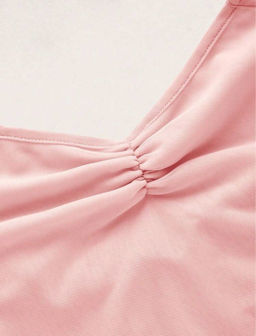 Pink Halter Neck Crop Top (Category: Sleeveless) located in Muntinlupa City. Submitted by szamiee25 (Listing ID 1461685863, Image 3). Description: - Cute pink halter neck crop top - Features ruched front and lettuce trim hem - Ties at the neck and back for adjustable fit - Super stretchy material for comfort - Versatile for summer outfits or layering - Pairs well with jeans or skirts - PM for When Worn or Other pics.