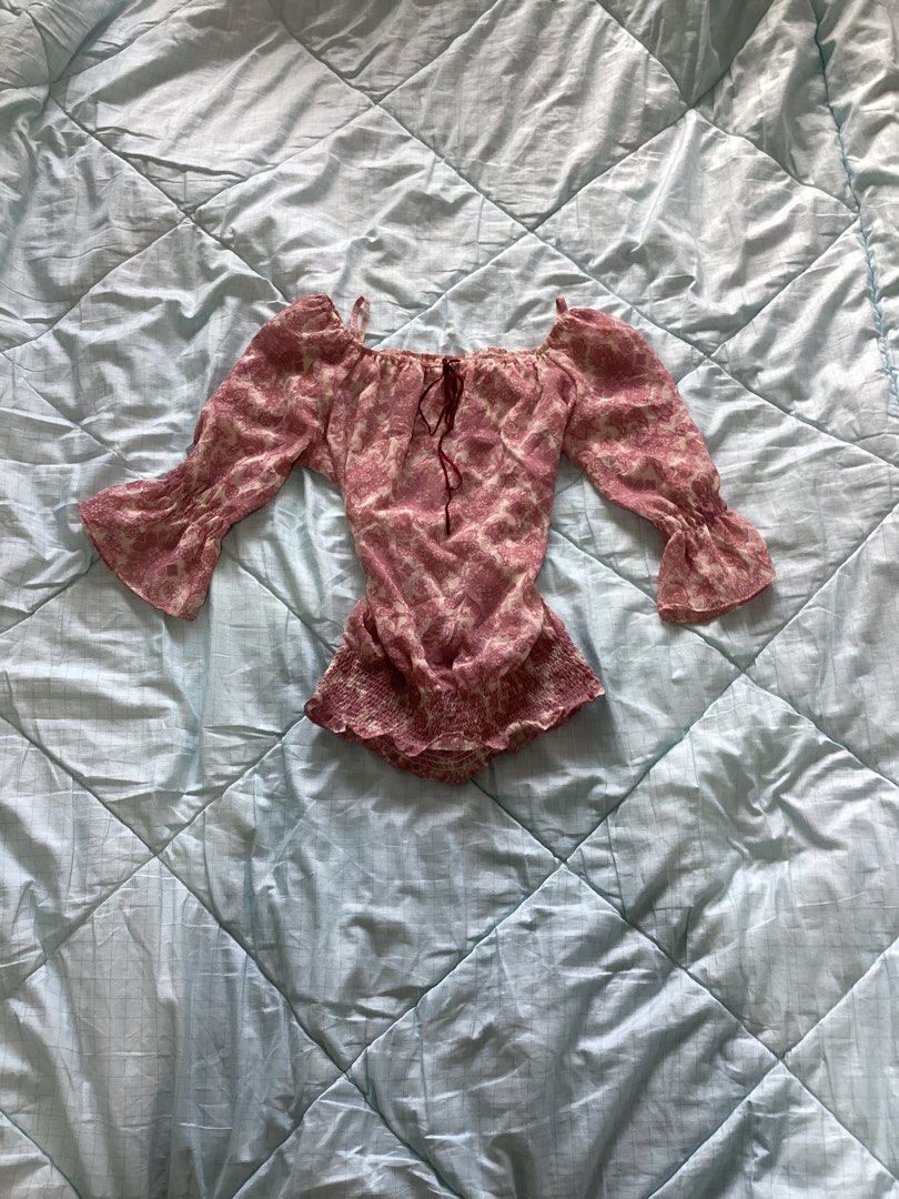 pink paisley off-shoulder top (Category: Blouses) located in Alfonso. Submitted by glenngarcia03 (Listing ID 1461780566, Image 1). Description: small to medium.