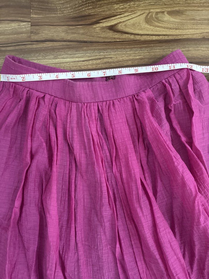 Pink Pleated Maxi Skirt (Category: Skirts) located in Pasig City. Submitted by slr1949 (Listing ID 1461568121, Image 2). Description: - Flowy pink maxi skirt - Comfortable elasticated waistband - All-around pleated design - Versatile for casual or dressed-up looks.