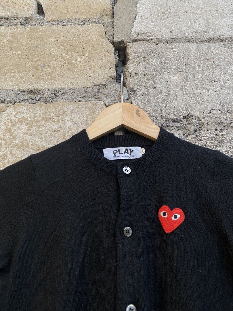 Play CDG Cardigan (Category: Coats, Jackets and Outerwear) located in Candaba. Submitted by dejesus.bench17 (Listing ID 1461792883, Image 2). Description: Comme des Garcons Play Cardigan -Color: Black -Condition: Excellent -Color rate: 9/10 -Issue: See last pic -Dimes: W15 L17 -Price: 650 + ship.