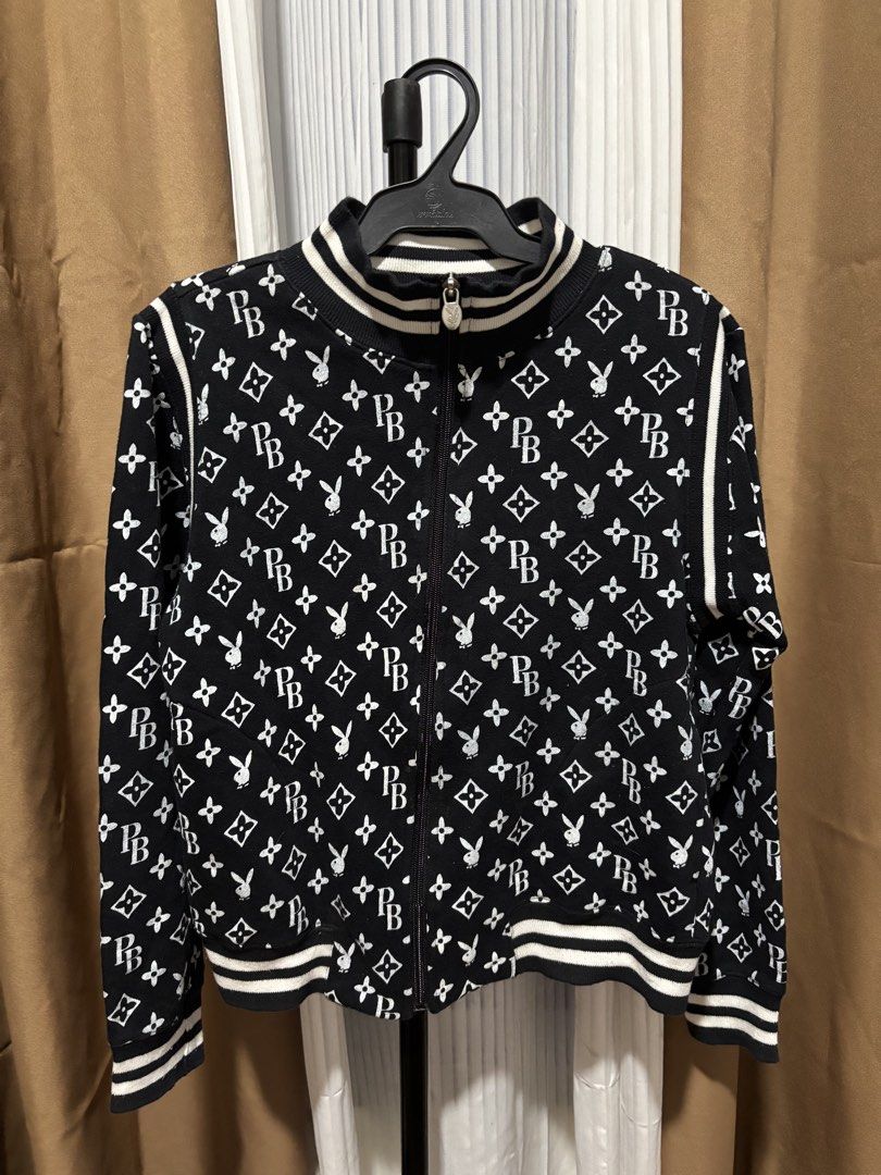Playboy Monogram Track Jacket Black White Size M (Category: Coats, Jackets and Outerwear) located in Roxas City. Submitted by hanzy_ (Listing ID 1461705465, Image 1). Description: - Authentic Playboy monogram track jacket - Classic black and white design - Features all-over Playboy bunny logo and 'PB' monogram - Ribbed collar, cuffs, and hem with stylish white stripes - Full zip closure for easy wear - Size: Medium (M) - Ideal for a cool, casual 