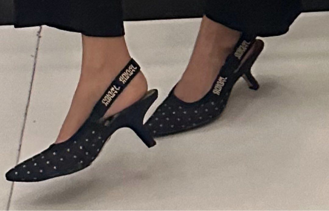 Polka dots Christian Dior slingback heels (Category: Sneakers & Footwear) located in Quezon City. Submitted by skinnyshopaholic (Listing ID 1461693233, Image 1). Description: Polka dior heels. Authentic. It has sole protector from Mr. Quickie. Needs cleaning. See flaws. RFS: Rarely used..