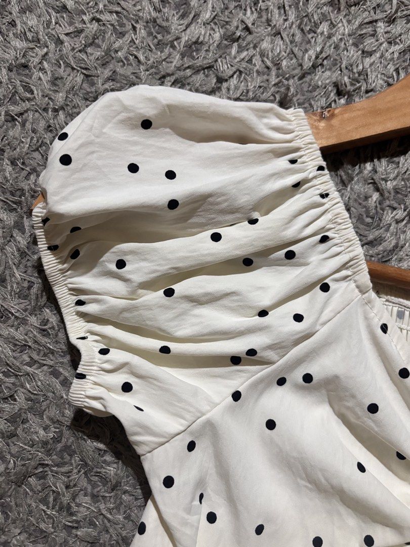 polka-dot puff-sleeve peplum top (Category: Blouses) located in Manila. Submitted by kattlacsamana (Listing ID 1461744115, Image 3). Description: For sale cream polka-dot puff-sleeve peplum top featuring center ruching and front tie details With tag/ So pretty in actual Size: S-M .