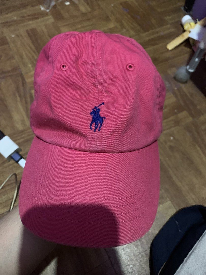 Polo Ralph Lauren Cap (Category: Caps & Hats) located in Manila. Submitted by usagichan_rabbit (Listing ID 1461574542, Image 1). Description: - Classic pink Polo Ralph Lauren cap, orignal from us. - Made from 100% cotton - Features iconic embroidered polo player logo on front - 'POLO' text embroidered on the back - Adjustable strap for a comfortable, custom fit - Ideal for everyday casual wear.