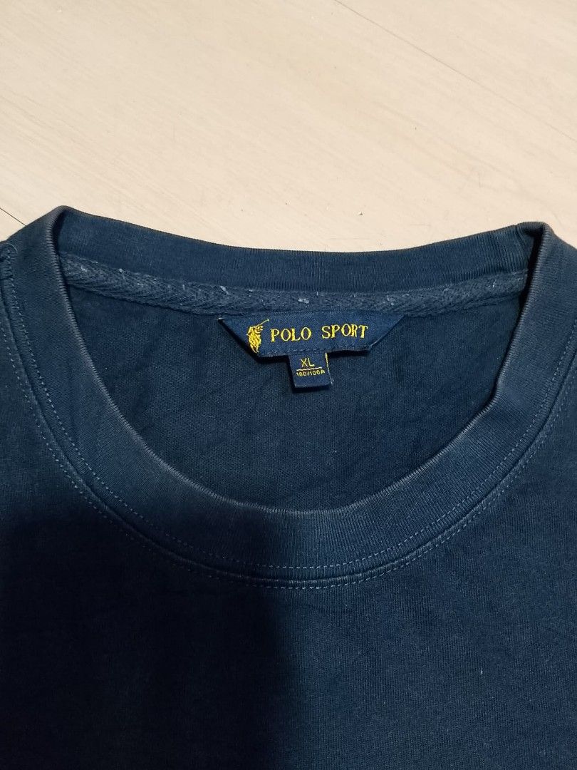 POLO SPORT TEXTURE GRAPHIC TEE (Category: Tshirts & Polo Shirts ) located in Mexico. Submitted by thethrift010203 (Listing ID 1461654636, Image 3). Description: AUTHENTIC/LEGIT POLO SPORT TEXTURE GRAPHIC TEE Color : NAVY BLUE Fabic : 85% COTTON 15% POLYESTER Size on tag: XL kasya sa SMALL to MEDIUM fit sa LARGE Sobrang ganda, Comfortable , EMBROIDERED LOGO Width : 22.6 Length : 28.4 Condition : EXCELLENT condition Issue : MANOR FADED SHOULDER MOP