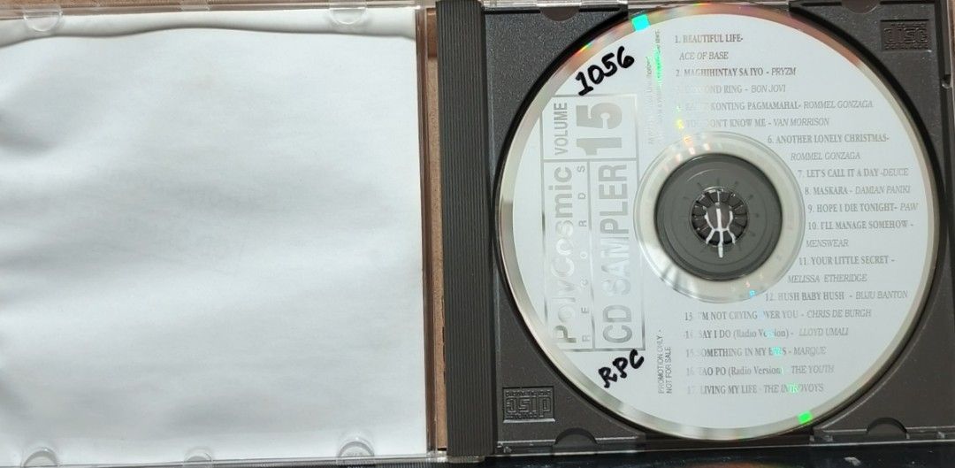 PolyCosmic Records CD Sampler Volume 15 Compilation (Category: CDs & DVDs) located in Manila. Submitted by ruelcabrer77078 (Listing ID 1461772137, Image 2). Description: - PolyCosmic Records CD Sampler Volume 15 - Features a diverse mix of artists and genres - Includes tracks from Ace of Base, Van Morrison, and others - Some handwritten notes on the tracklist - Perfect for music collectors or discovering new tunes.