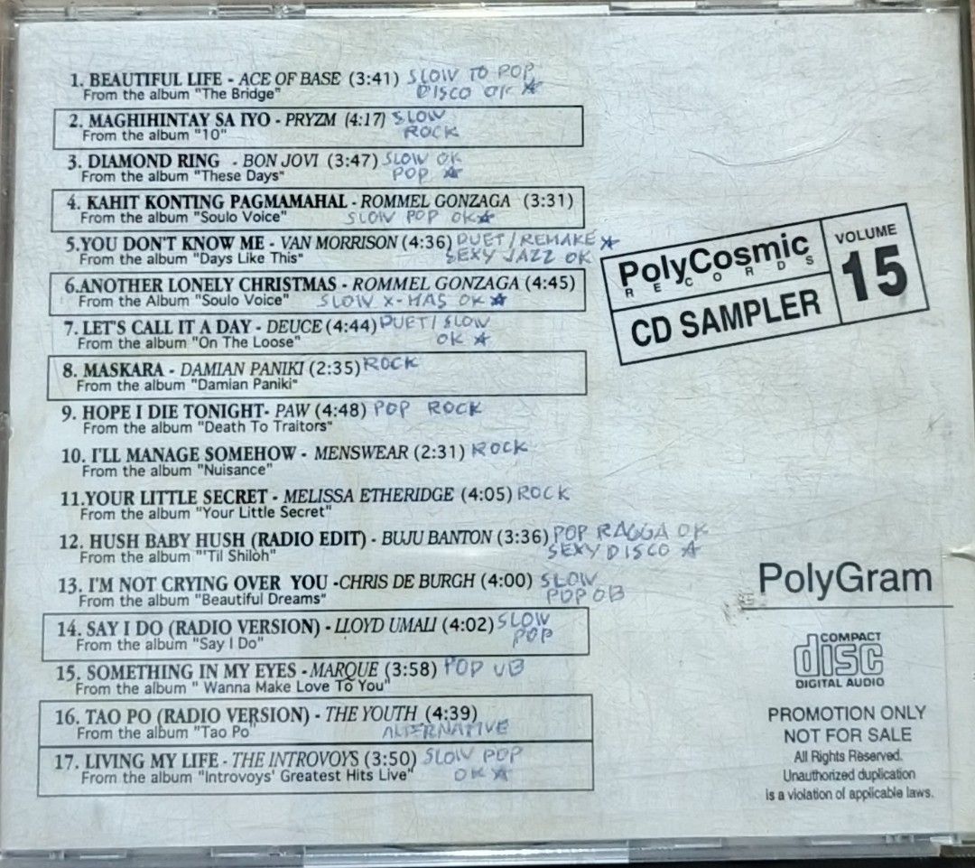 PolyCosmic Records CD Sampler Volume 15 Compilation (Category: CDs & DVDs) located in Manila. Submitted by ruelcabrer77078 (Listing ID 1461772137, Image 3). Description: - PolyCosmic Records CD Sampler Volume 15 - Features a diverse mix of artists and genres - Includes tracks from Ace of Base, Van Morrison, and others - Some handwritten notes on the tracklist - Perfect for music collectors or discovering new tunes.