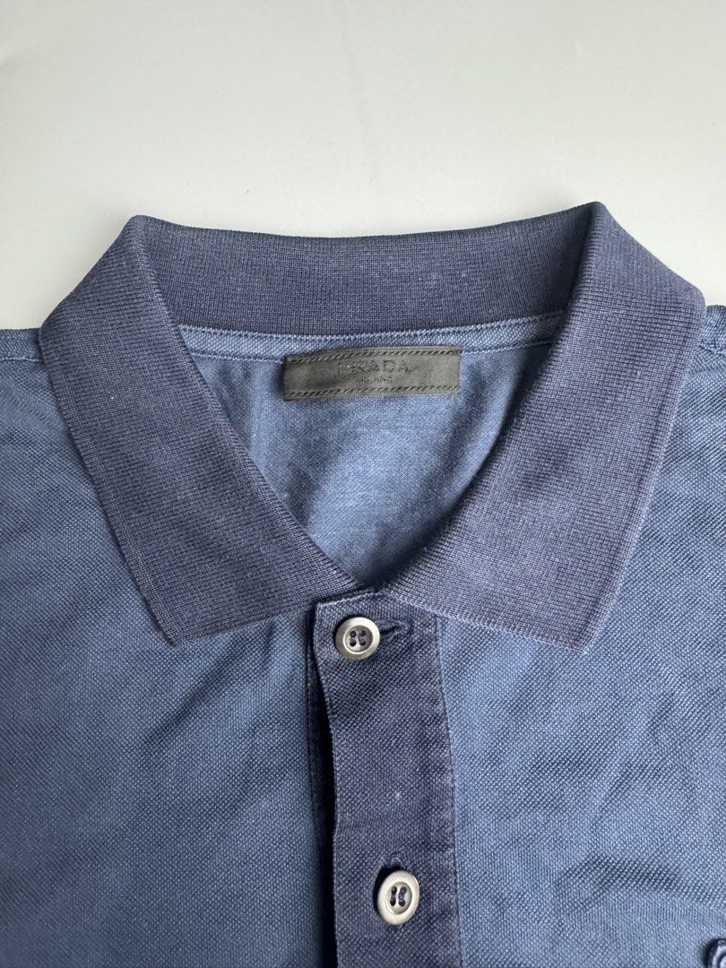 Prada - Pique Navy - Polo Shirt (Category: Luxury Apparel) located in San Pablo. Submitted by hiddenrygn (Listing ID 1461576337, Image 3). Description: Prada - Pique Navy - Polo Shirt Size : S (20” 28”) No major flaws Still in excellent condition Authentic DM!.