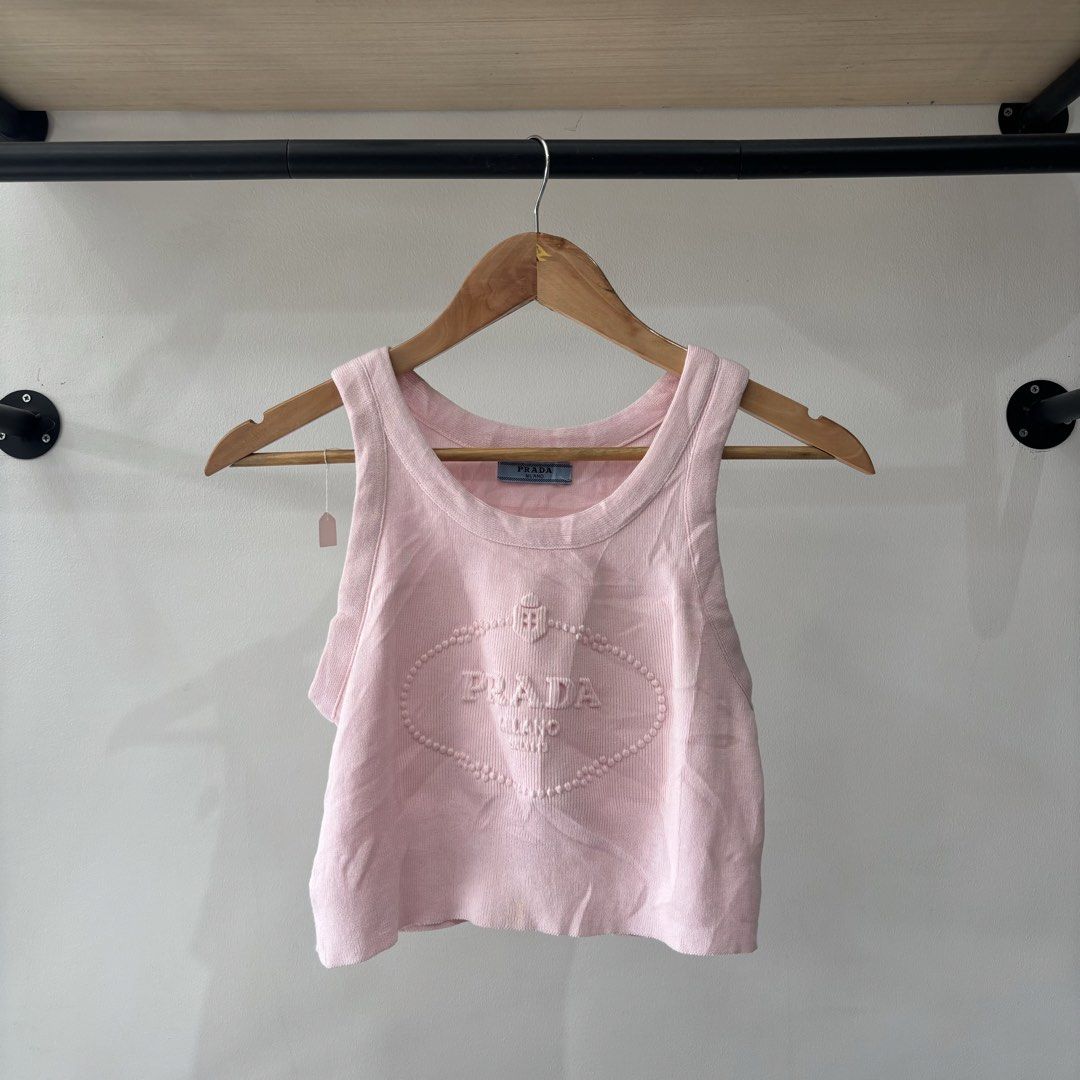 Prada Embosed design knitted sando (Category: Others Tops) located in Bambang. Submitted by heats777 (Listing ID 1461673724, Image 1). Description: Excellent condition Cut washtag Best fit to XS - Small .