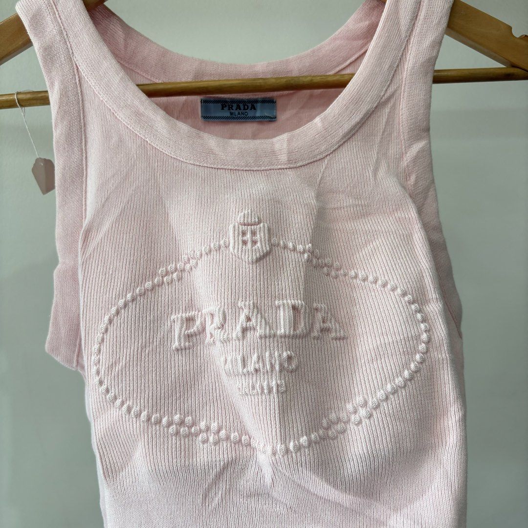 Prada Embosed design knitted sando (Category: Others Tops) located in Bambang. Submitted by heats777 (Listing ID 1461673724, Image 3). Description: Excellent condition Cut washtag Best fit to XS - Small .