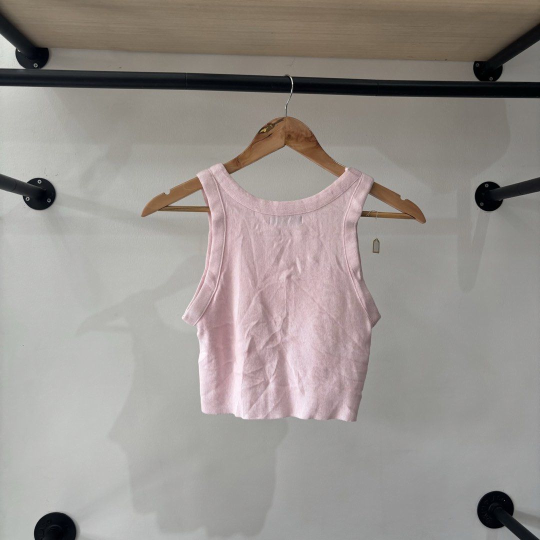 Prada Embosed design knitted sando (Category: Others Tops) located in Bambang. Submitted by heats777 (Listing ID 1461673724, Image 2). Description: Excellent condition Cut washtag Best fit to XS - Small .