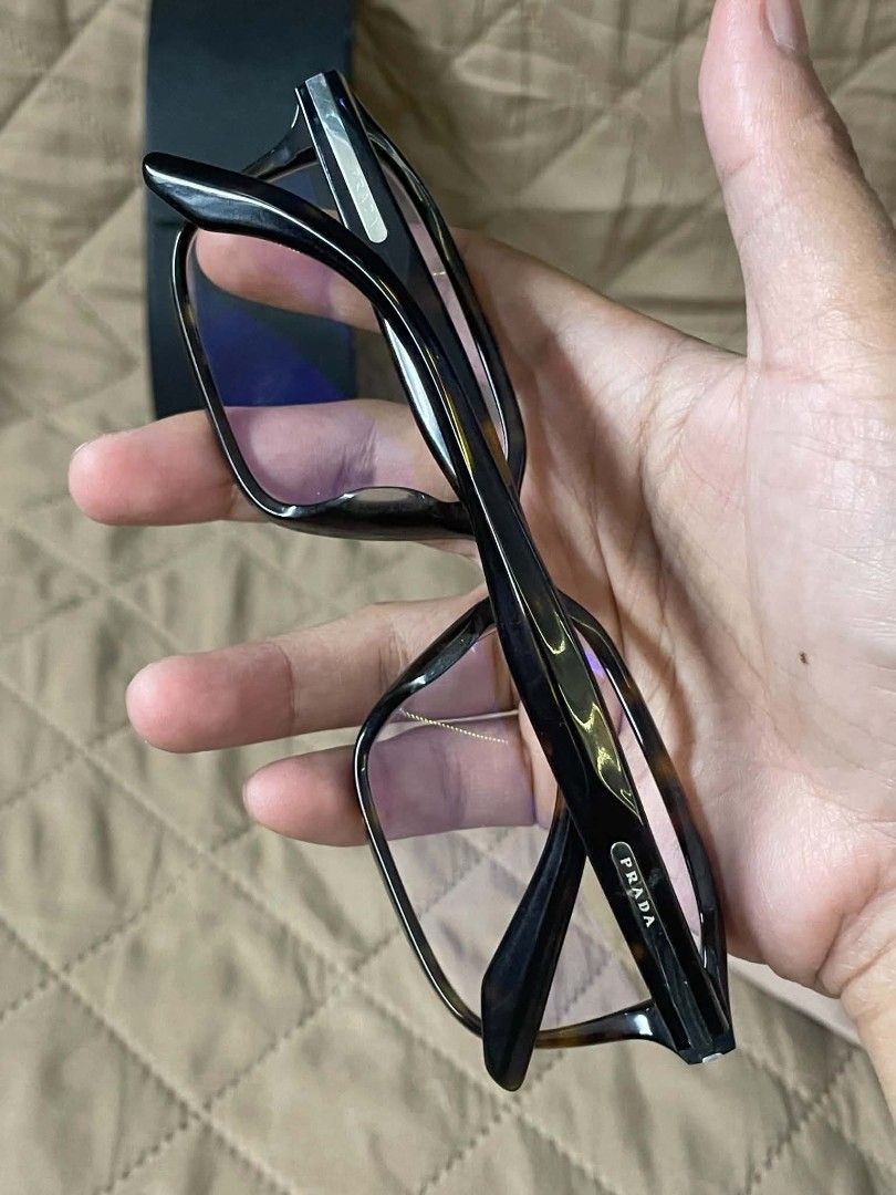 Prada Eyeglasses 2AU-101 (Category: Sunglasses & Eyewear) located in Baguio. Submitted by four_your_eyes_only (Listing ID 1461642727, Image 2). Description: - Authentic Prada eyeglasses - black frame - Model: 2AU-101 - Size: 55 17 140 - Prescription lenses (will need replacement) - Comes with original Prada case.