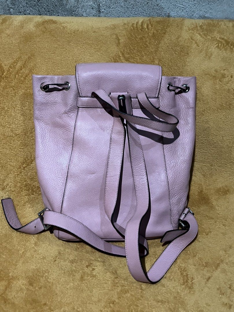 Prada Pink Backpack (Category: Backpacks) located in Adams. Submitted by princess.maggie (Listing ID 1461691937, Image 2). Description: - good condition - ukay source -may minor peel lang at front.