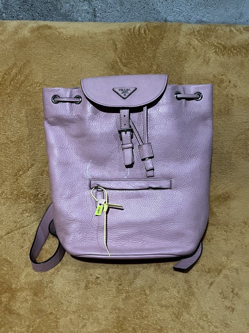 Prada Pink Backpack (Category: Backpacks) located in Adams. Submitted by princess.maggie (Listing ID 1461691937, Image 1). Description: - good condition - ukay source -may minor peel lang at front.