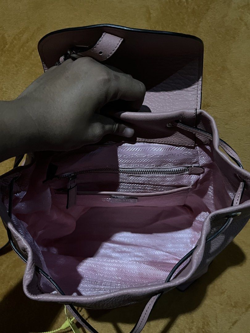 Prada Pink Backpack (Category: Backpacks) located in Adams. Submitted by princess.maggie (Listing ID 1461691937, Image 3). Description: - good condition - ukay source -may minor peel lang at front.