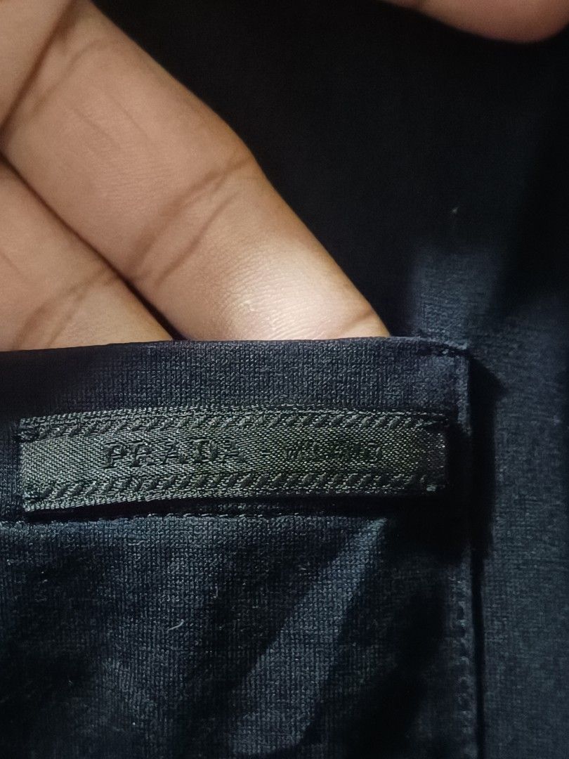Prada Pocket shirt black (Category: Luxury Apparel) located in Cebu City. Submitted by negotiableprice22 (Listing ID 1461671771, Image 3). Description: Prada pocket shirt classic shirt You can find the logo at its pocket Dimes measured on flat surface Width 22.5 inch Length 27.5 inch available price negotiable.