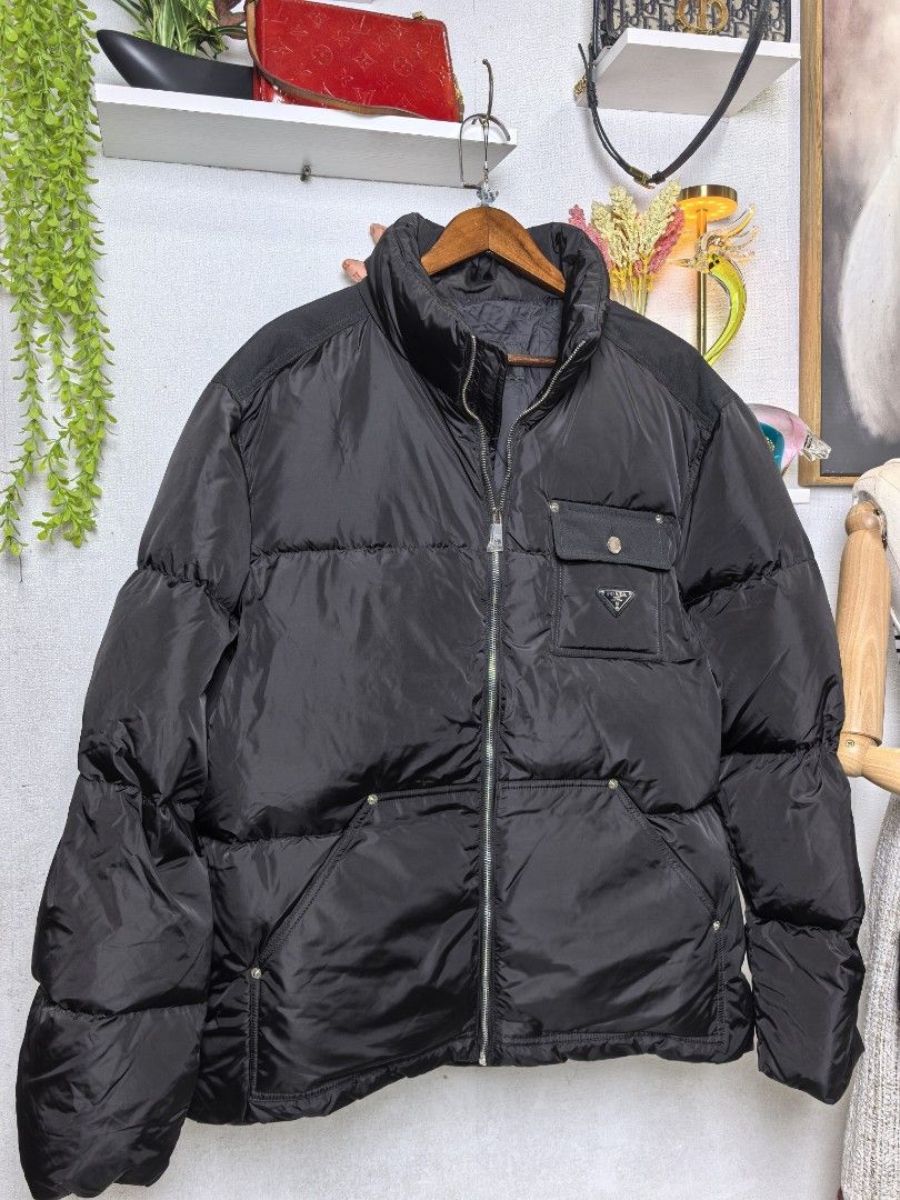 Prada puffer jacket (Category: Luxury Apparel) located in Baguio. Submitted by ashzachary (Listing ID 1461735075, Image 3). Description: Prada puffer jacket Condition :Excellent condition Color rate 10/10 Size : large semi xL Inches:W/L No issues No flaws Super ganda sa personal Pm. More details Good quality Plsss 📌No Bogus 📌No return MOP What you see is what you get PALAWAN, CEBUNA GCASH AND BDO Reminder😊 We're selling thrifted clothes so ple