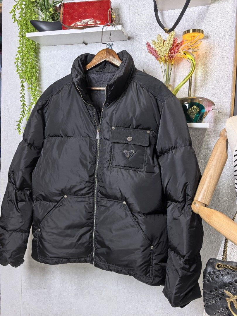 Prada puffer jacket (Category: Luxury Apparel) located in Baguio. Submitted by ashzachary (Listing ID 1461735075, Image 2). Description: Prada puffer jacket Condition :Excellent condition Color rate 10/10 Size : large semi xL Inches:W/L No issues No flaws Super ganda sa personal Pm. More details Good quality Plsss 📌No Bogus 📌No return MOP What you see is what you get PALAWAN, CEBUNA GCASH AND BDO Reminder😊 We're selling thrifted clothes so ple