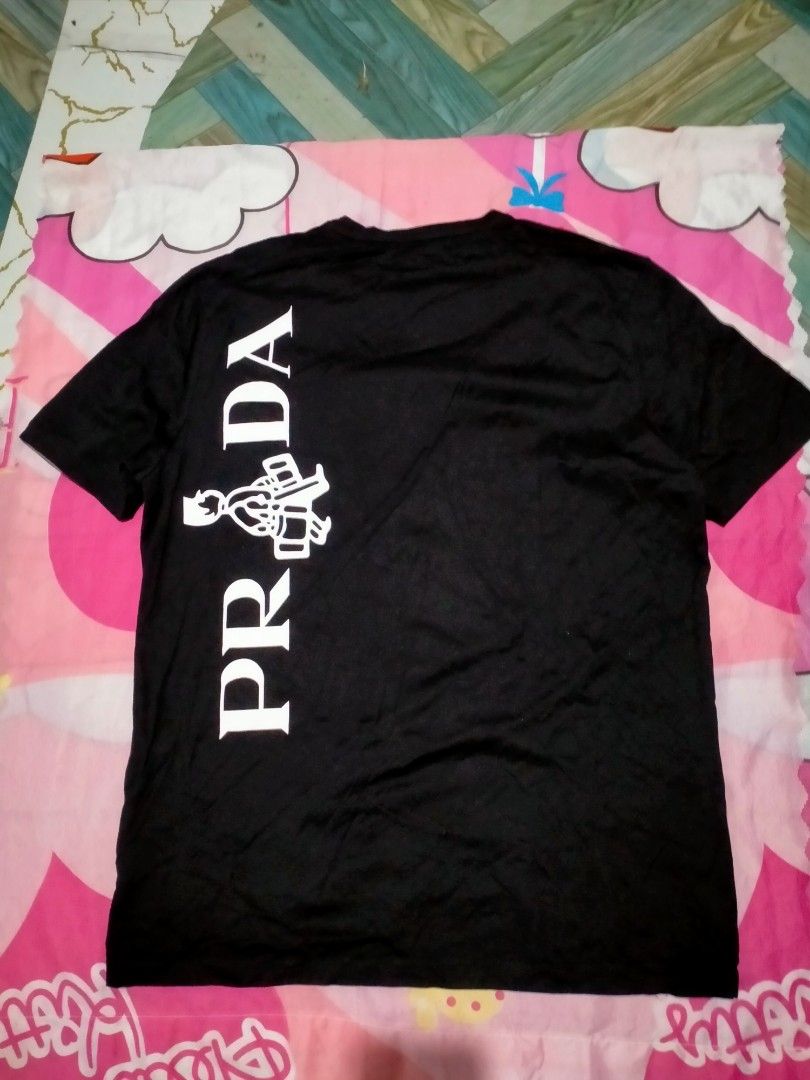 PRADA RUBBER RED WITH EMBLEM (Category: Tshirts & Polo Shirts ) located in Bulacan. Submitted by rathrifts01 (Listing ID 1461691714, Image 2). Description: EXCELLENT CONDITION SIZE XXXL ON THE TAGS DIMES 21.5 X 29.5 COLORATE 9.5/10 NO ISSUE 1499PHP PLUS SHIPPING FEE ONLY.