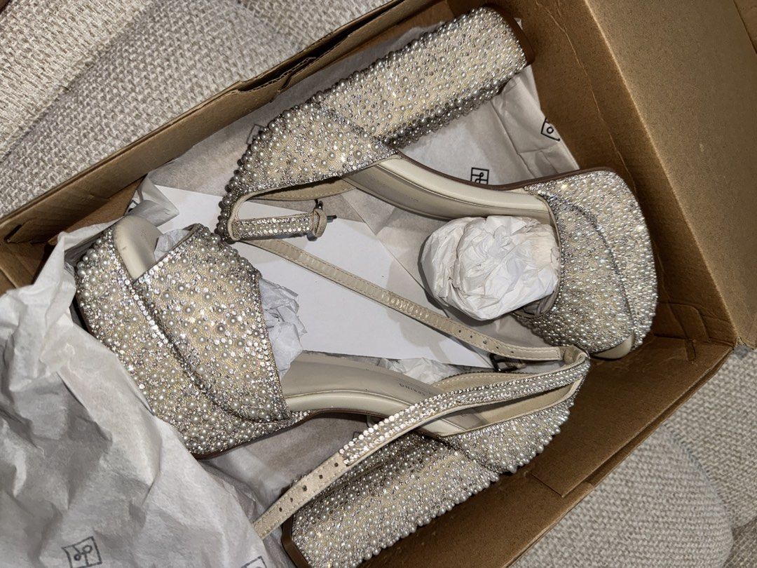 Pre-loved Call It Spring Embellished Heels (Category: Heels) located in Baliuag. Submitted by arata.listings (Listing ID 1461641359, Image 2). Description: - Sparkly heels from Call It Spring - Adorned with pearls and rhinestones - Secure ankle strap - Comfortable platform sole - Ideal for weddings and special events - Comes with original box Pre-loved bridal shoes for sale ✨ Used ONCE Brand: Call it Spring Model: Domminique Ice Price: ₱4,000 (sh